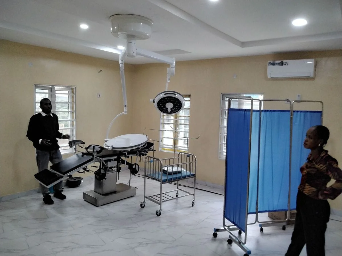 Medical team performing surgery in a modern operating room